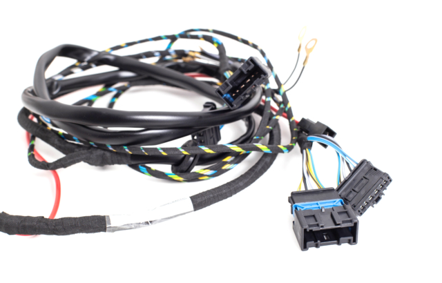 Braided,automotive,wiring,with,electrical,connectors,on,white,background,,isolate.